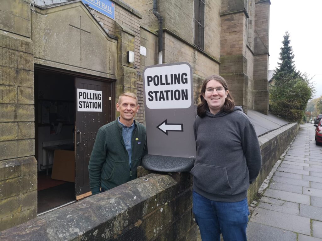Scott Cunliffe and Alex Hall outside a polling station in Trinity Ward.